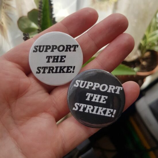 SUPPORT THE STRIKE! badge